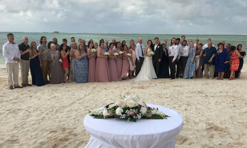 Beach wedding family